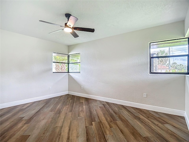 1611 Canal, Tavares, FL 32778 - spare room with wood finished floors, a ceiling fan, and a textured wall