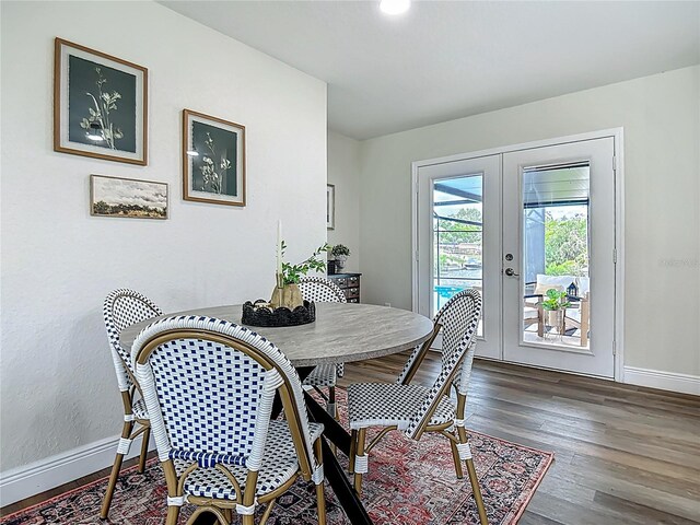 1611 Canal, Tavares, FL 32778 - dining room featuring french doors and wood finished floors