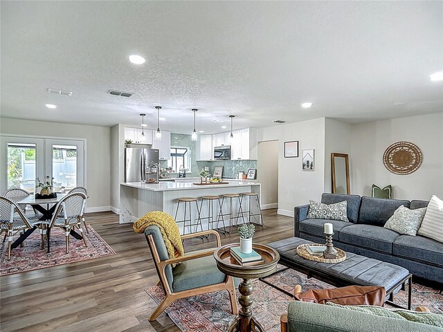 1611 Canal, Tavares, FL 32778 - living area featuring recessed lighting, dark wood-style flooring, and plenty of natural light