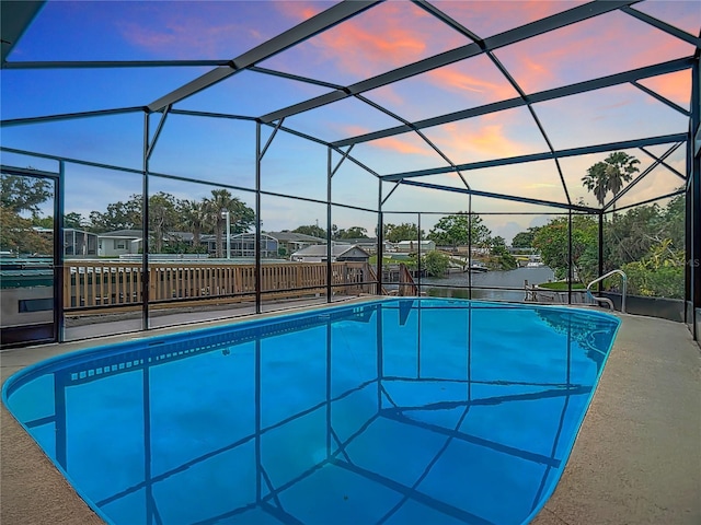1611 Canal, Tavares, FL 32778 - pool at dusk with an outdoor pool and a patio
