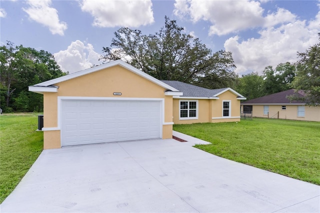 14631 SE 95th Ct, Summerfield, FL 34491 - ranch-style house with stucco siding, driveway, a garage, and a front lawn