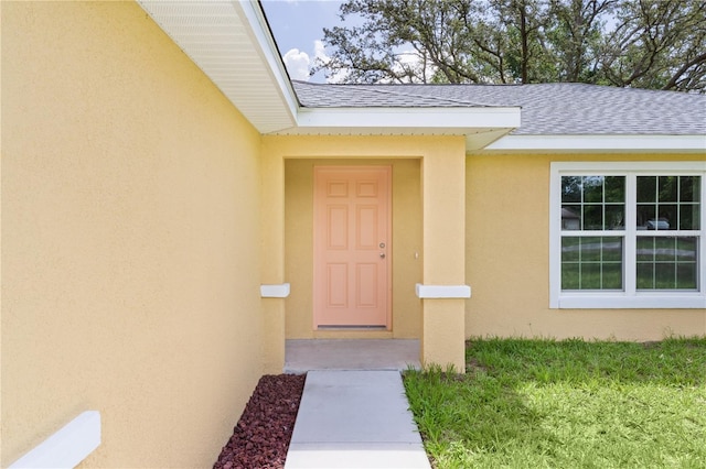 14631 SE 95th Ct, Summerfield, FL 34491 - property entrance featuring stucco siding and roof with shingles
