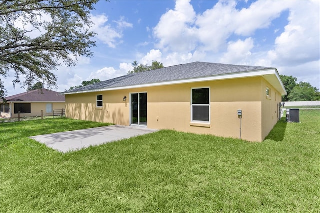 14631 SE 95th Ct, Summerfield, FL 34491 - rear view of property featuring stucco siding, a patio area, and roof with shingles