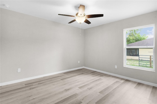 14631 SE 95th Ct, Summerfield, FL 34491 - empty room featuring light wood-style floors, a ceiling fan, and a smoke detector