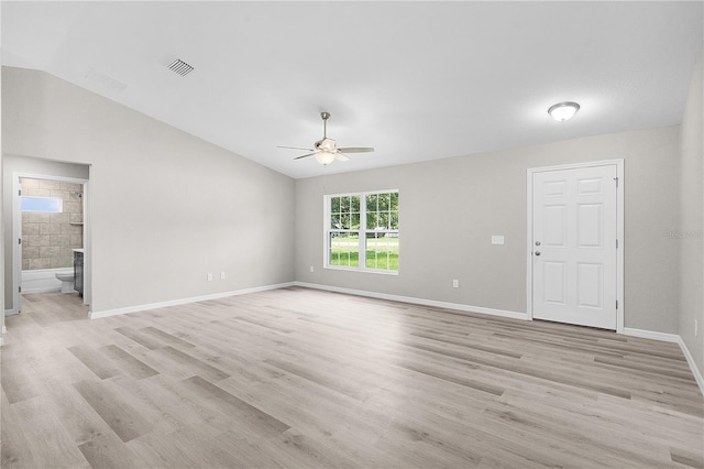 14631 SE 95th Ct, Summerfield, FL 34491 - empty room with a ceiling fan, light wood-type flooring, and vaulted ceiling