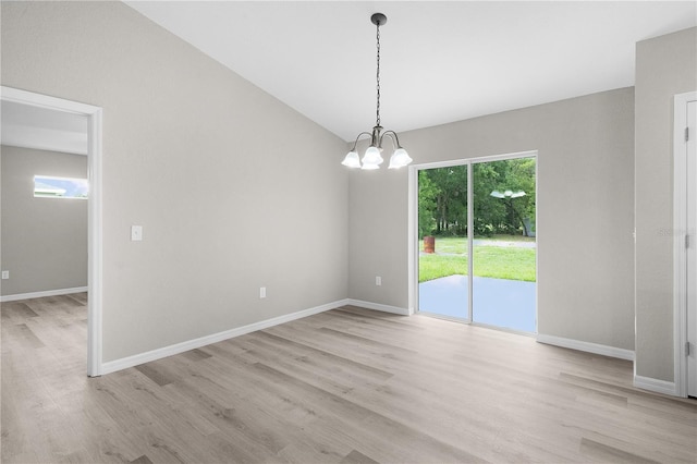 14631 SE 95th Ct, Summerfield, FL 34491 - spare room with light wood-style floors and a chandelier