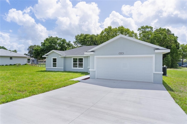 14611 SE 95th Ct, Summerfield, FL 34491 - ranch-style house featuring stucco siding, an attached garage, concrete driveway, a front lawn, and a shingled roof