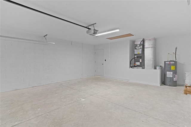 14611 SE 95th Ct, Summerfield, FL 34491 - garage with a garage door opener, electric water heater, concrete block wall, and heating unit