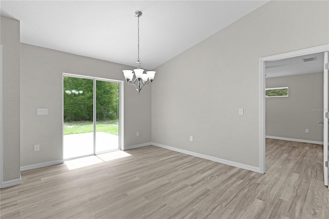 14611 SE 95th Ct, Summerfield, FL 34491 - spare room with light wood-style flooring and a chandelier