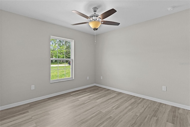14611 SE 95th Ct, Summerfield, FL 34491 - unfurnished room with a smoke detector, light wood-style flooring, and a ceiling fan