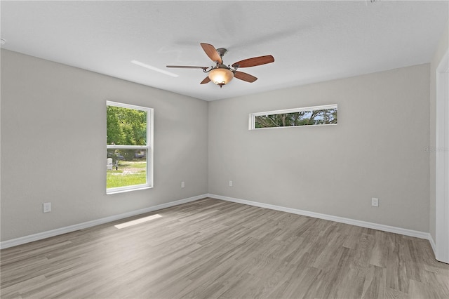 14611 SE 95th Ct, Summerfield, FL 34491 - spare room with wood finished floors and ceiling fan