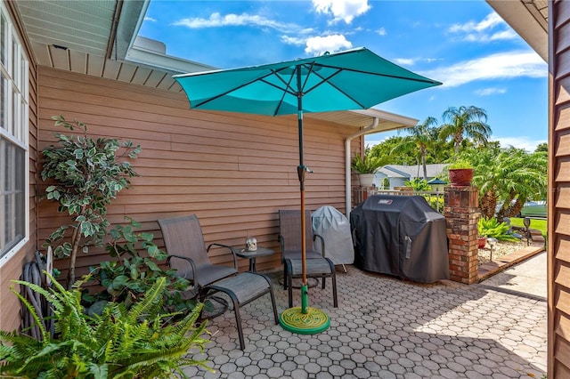 5512 Rosewall Cir, Leesburg, FL 34748 - view of patio featuring a grill