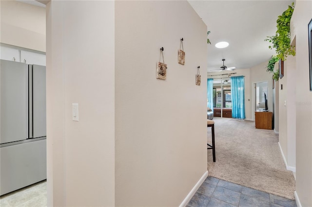 5512 Rosewall Cir, Leesburg, FL 34748 - corridor featuring carpet floors and stone finish flooring