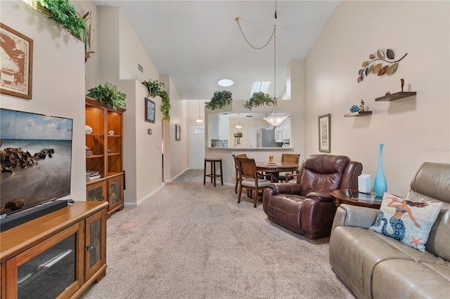 5512 Rosewall Cir, Leesburg, FL 34748 - living room featuring carpet floors and high vaulted ceiling