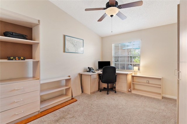 5512 Rosewall Cir, Leesburg, FL 34748 - office area featuring lofted ceiling, light colored carpet, a textured ceiling, and a ceiling fan