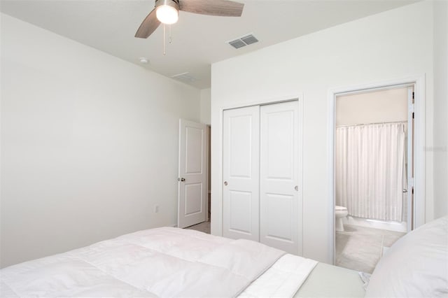 1696 Wilson Prairie Cir, Groveland, FL 34736 - bedroom featuring a closet, ensuite bath, and ceiling fan