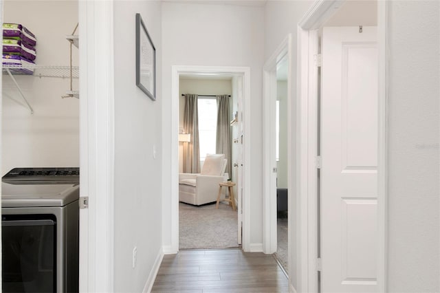 1696 Wilson Prairie Cir, Groveland, FL 34736 - washroom featuring wood finished floors and baseboards