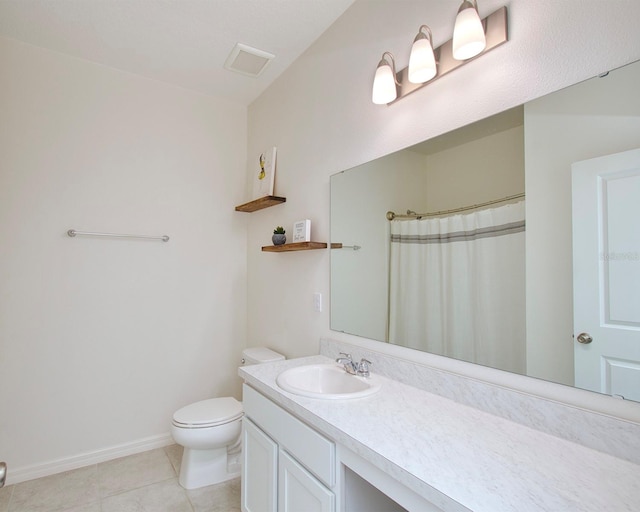 1696 Wilson Prairie Cir, Groveland, FL 34736 - full bath with tile patterned floors, vanity, and a shower with curtain