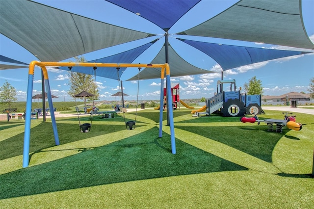1696 Wilson Prairie Cir, Groveland, FL 34736 - community jungle gym with a lawn