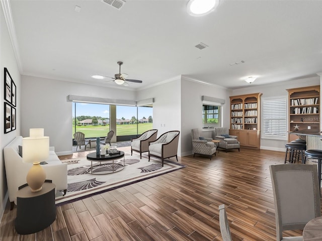 12198 SE 176th Loop, Summerfield, FL 34491 - living area with ceiling fan, plenty of natural light, wood finished floors, and ornamental molding