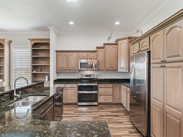 12198 SE 176th Loop, Summerfield, FL 34491 - kitchen with stainless steel appliances, open shelves, light wood-type flooring, crown molding, and dark stone countertops
