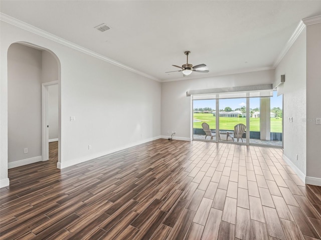 12198 SE 176th Loop, Summerfield, FL 34491 - empty room with a ceiling fan, dark wood-type flooring, arched walkways, ornamental molding, and view of golf course