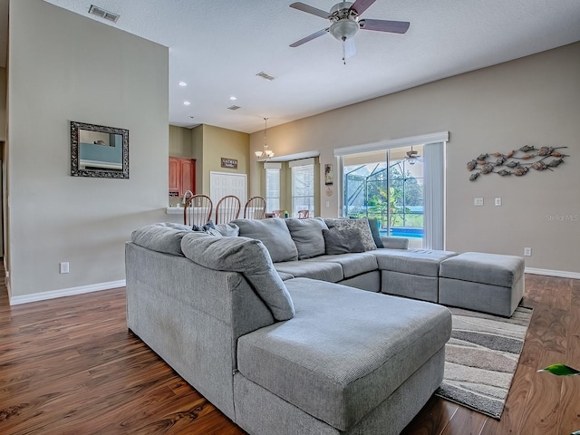 359 Blue Branch St, Eustis, FL 32736 - living area featuring a ceiling fan, dark wood-style flooring, a chandelier, and recessed lighting