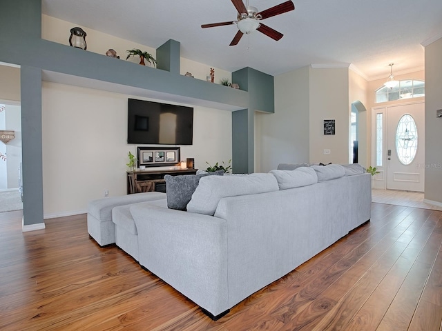 359 Blue Branch St, Eustis, FL 32736 - living room featuring a ceiling fan, light wood-style flooring, and ornamental molding