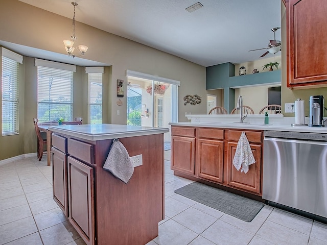 359 Blue Branch St, Eustis, FL 32736 - kitchen with stainless steel dishwasher, light tile patterned floors, light countertops, and a ceiling fan