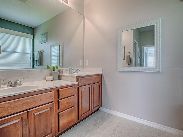 359 Blue Branch St, Eustis, FL 32736 - bathroom featuring double vanity and tile patterned floors