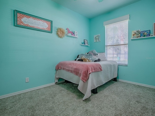 359 Blue Branch St, Eustis, FL 32736 - carpeted bedroom featuring baseboards