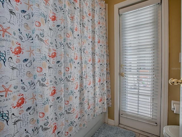 359 Blue Branch St, Eustis, FL 32736 - bathroom with a shower with shower curtain and tile patterned flooring