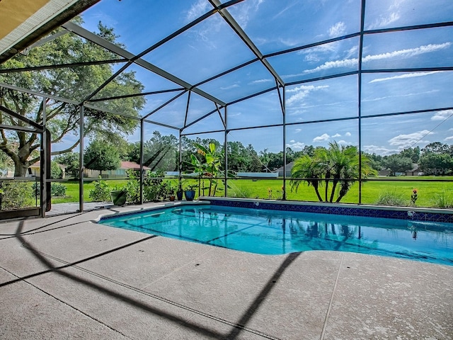 359 Blue Branch St, Eustis, FL 32736 - swimming pool featuring a patio area, a lawn, and glass enclosure