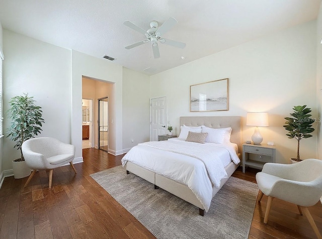101 Flame Vine Way, Groveland, FL 34736 - bedroom with hardwood / wood-style flooring, ceiling fan, and ensuite bath