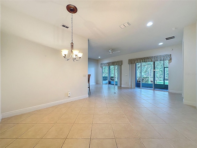 101 Flame Vine Way, Groveland, FL 34736 - empty room with light tile patterned flooring, plenty of natural light, recessed lighting, and a chandelier