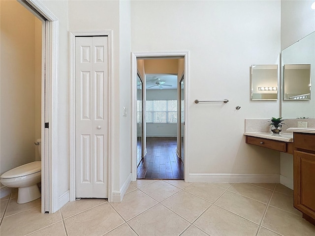 101 Flame Vine Way, Groveland, FL 34736 - bathroom with vanity, tile patterned floors, and ceiling fan