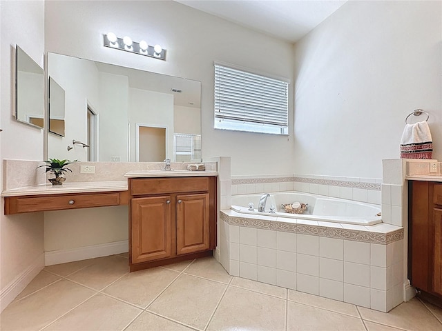 101 Flame Vine Way, Groveland, FL 34736 - bathroom featuring tile patterned floors, a bath, and vanity