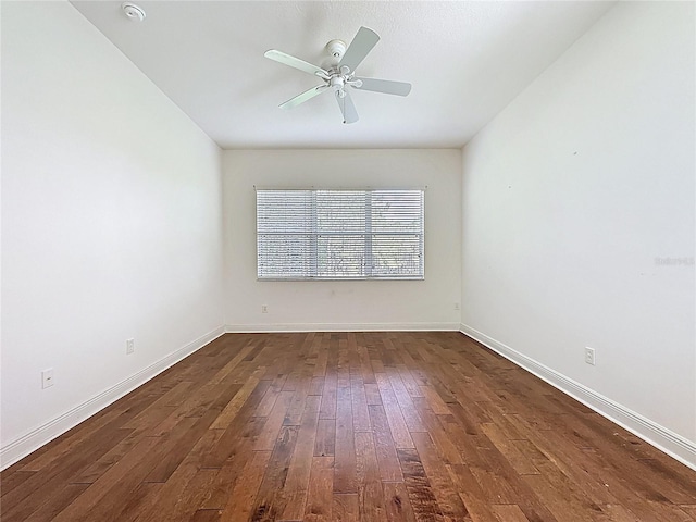 101 Flame Vine Way, Groveland, FL 34736 - empty room featuring dark wood-style flooring, a ceiling fan, and a smoke detector