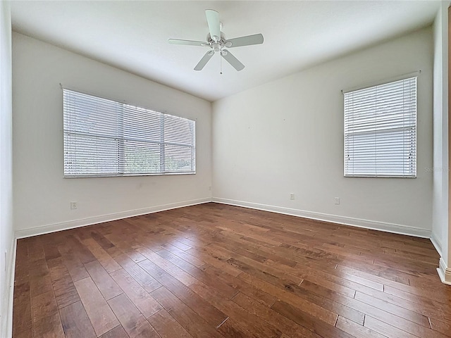 101 Flame Vine Way, Groveland, FL 34736 - spare room featuring dark wood-style floors and a ceiling fan