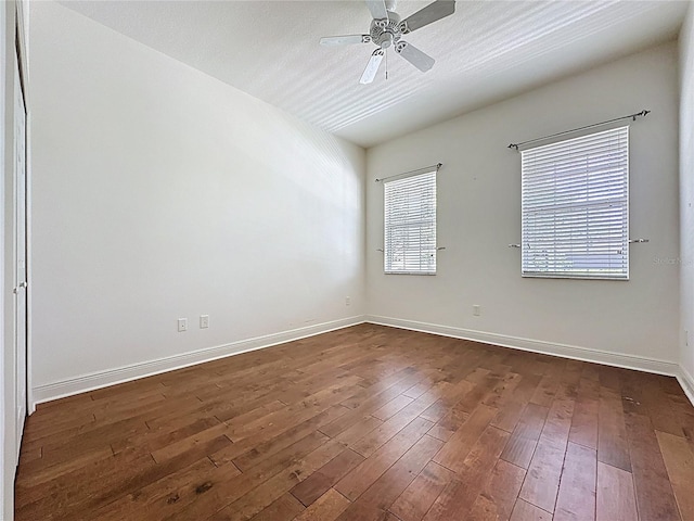 101 Flame Vine Way, Groveland, FL 34736 - unfurnished room with dark wood-style flooring and a ceiling fan