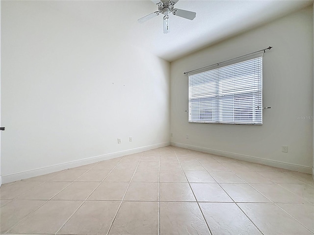 101 Flame Vine Way, Groveland, FL 34736 - empty room with a ceiling fan, light tile patterned flooring, and vaulted ceiling