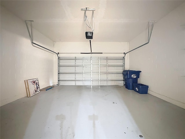 101 Flame Vine Way, Groveland, FL 34736 - garage featuring a garage door opener