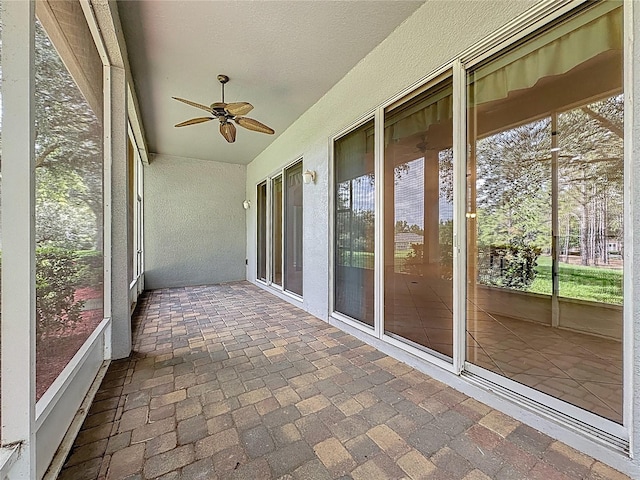 101 Flame Vine Way, Groveland, FL 34736 - unfurnished sunroom with ceiling fan and healthy amount of natural light