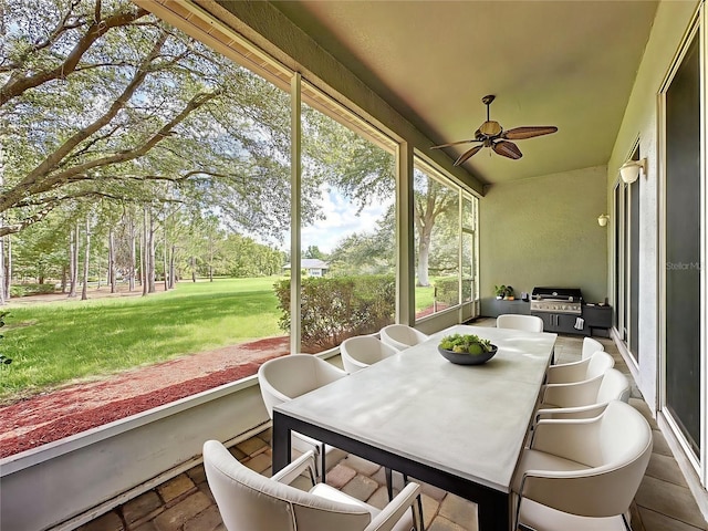 101 Flame Vine Way, Groveland, FL 34736 - sunroom / solarium featuring a ceiling fan and outdoor dining space
