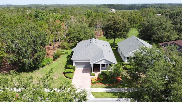 101 Flame Vine Way, Groveland, FL 34736 - aerial view of property and surrounding area featuring a heavily wooded area