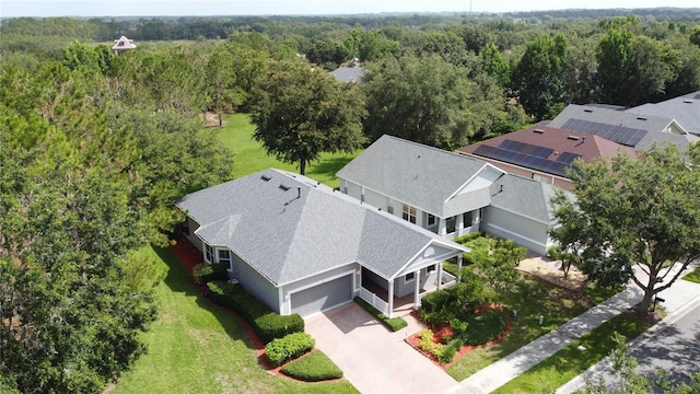 101 Flame Vine Way, Groveland, FL 34736 - aerial view of property and surrounding area with a heavily wooded area