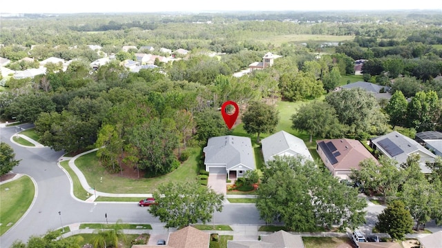 101 Flame Vine Way, Groveland, FL 34736 - aerial view of residential area featuring a heavily wooded area