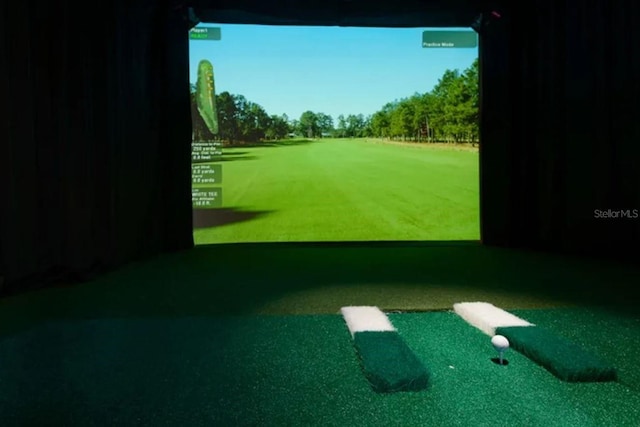 101 Flame Vine Way, Groveland, FL 34736 - game room featuring golf simulator