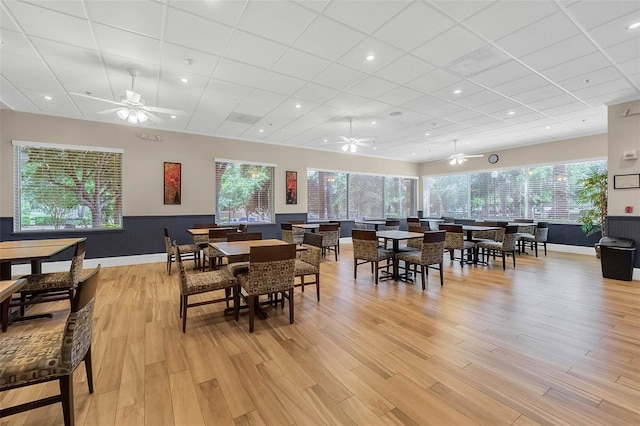 3586 Eversholt St, Clermont, FL 34711 - dining space featuring ceiling fan, light wood-style flooring, plenty of natural light, a paneled ceiling, and recessed lighting