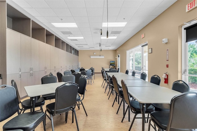 3586 Eversholt St, Clermont, FL 34711 - dining room featuring a paneled ceiling and light wood finished floors